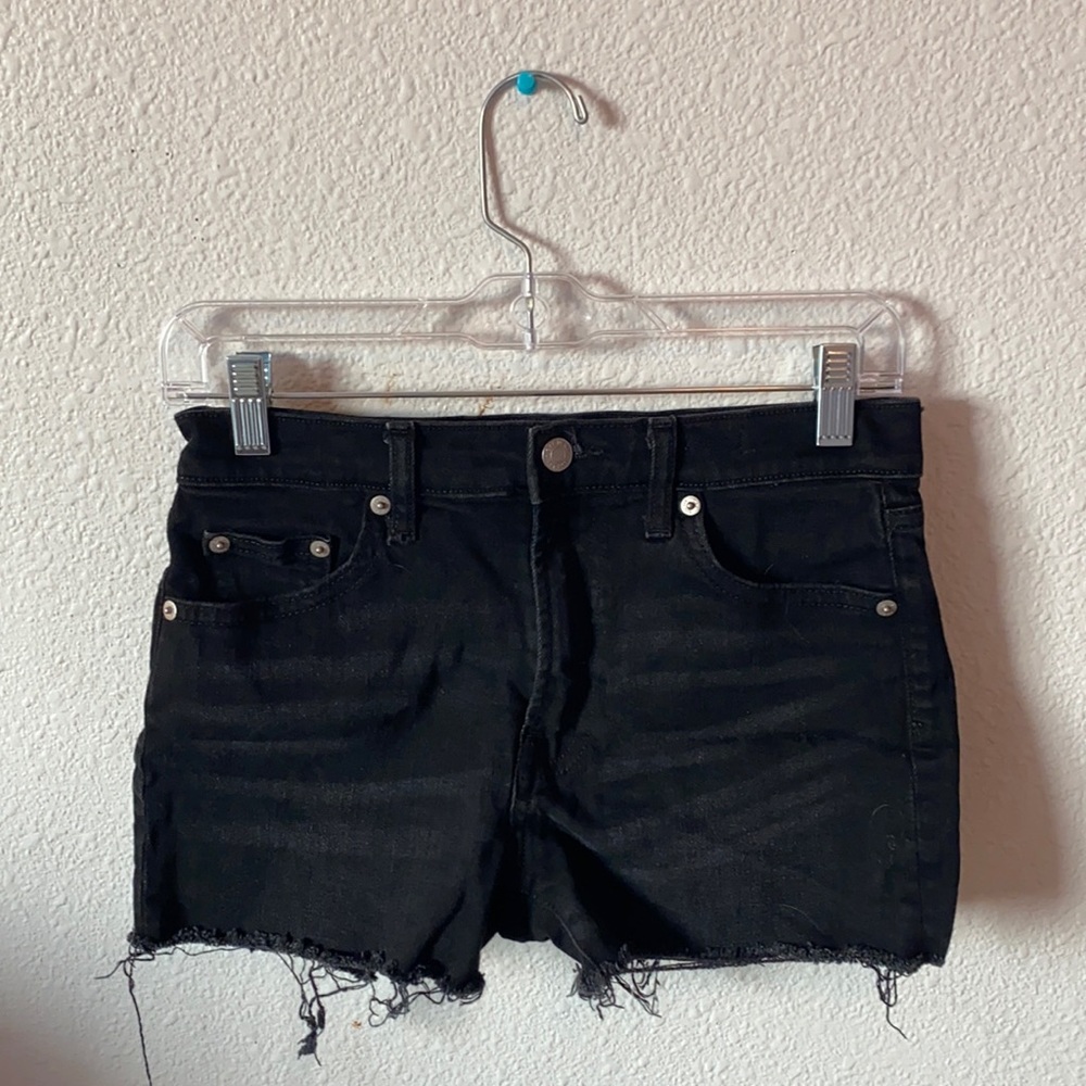 Black distressed jean shorts
